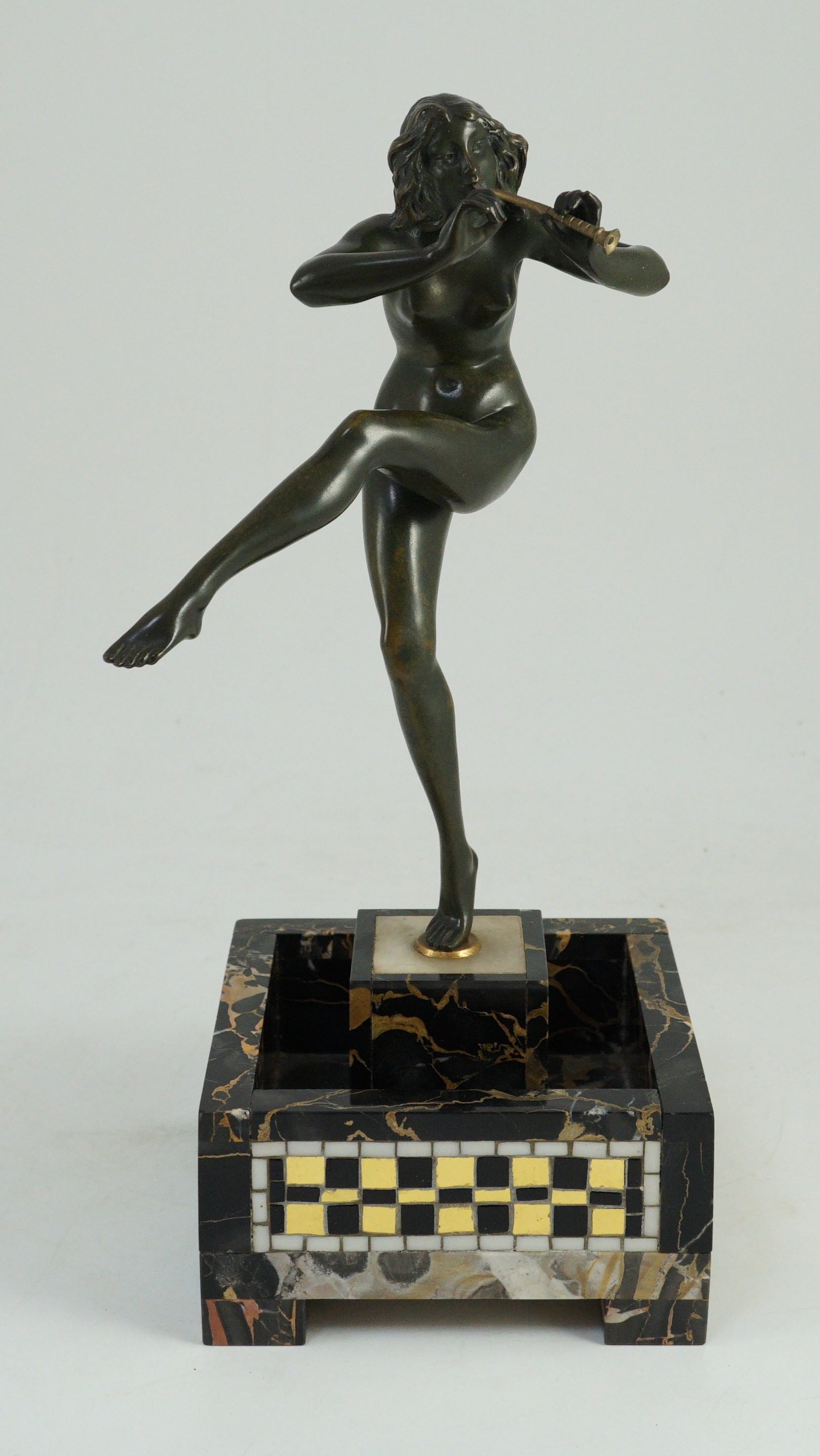 Pierre Le Faguays (1892-1962). An Art Deco bronze figure of a female pan piper, 15cm wide 37cm high overall